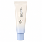 A tube of COSRX Beauty of Joseon Relief Sun Milk Sunscreen on a solid white background. The tube features a white-to-light-blue gradient design with black Korean text and a small red seal.