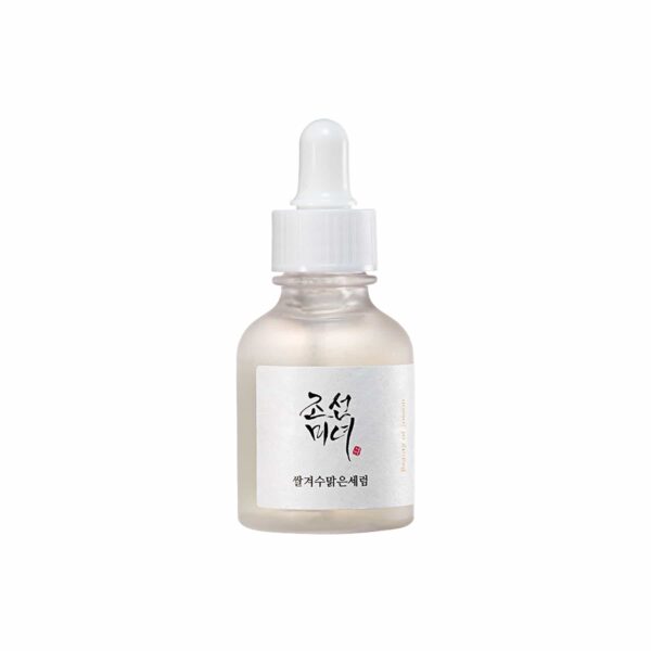 Skincare serum bottle with dropper on a white background
