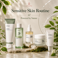 Five skincare products arranged on stone slabs with green leaves and a glass bowl in a softly lit setting. Text at the top reads 'KPOPN Sensitive Skin Routine Powered by Nature.